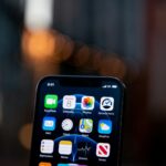 black iphone 4 displaying icons